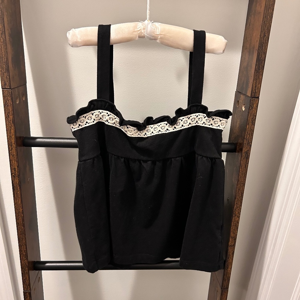 Cropped tank with ruffle and lace trim detail, button back closure